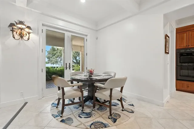 a bathroom with a sink a mirror and toilet