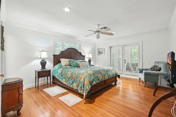 a view of a swimming pool with an outdoor space and seating area