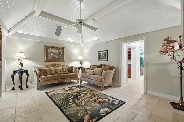 a view of house with outdoor space and garden