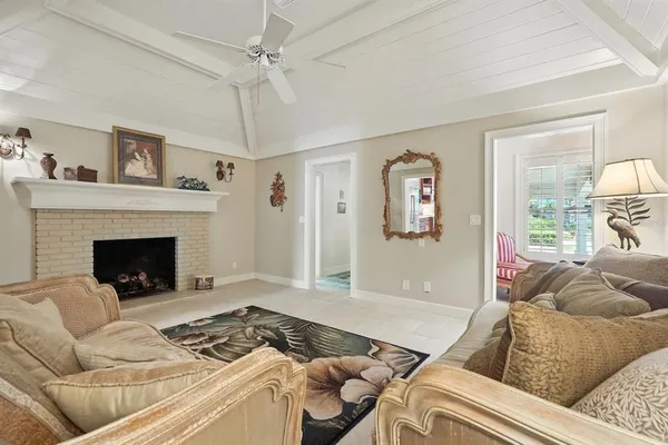 an aerial view of a house with a lake view