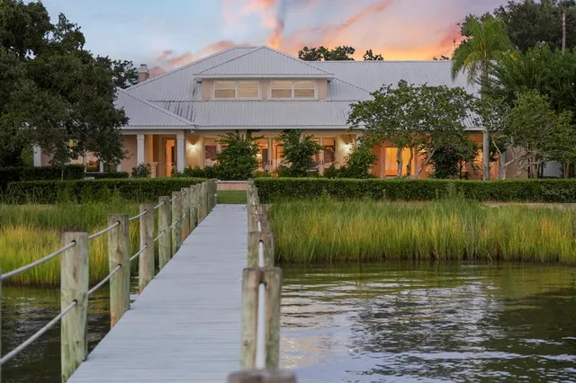 a picture of a livingroom with furniture and a couch