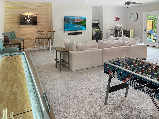 a bedroom with a bed and cabinets