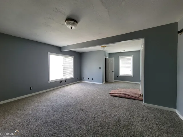a view of a livingroom with a fireplace