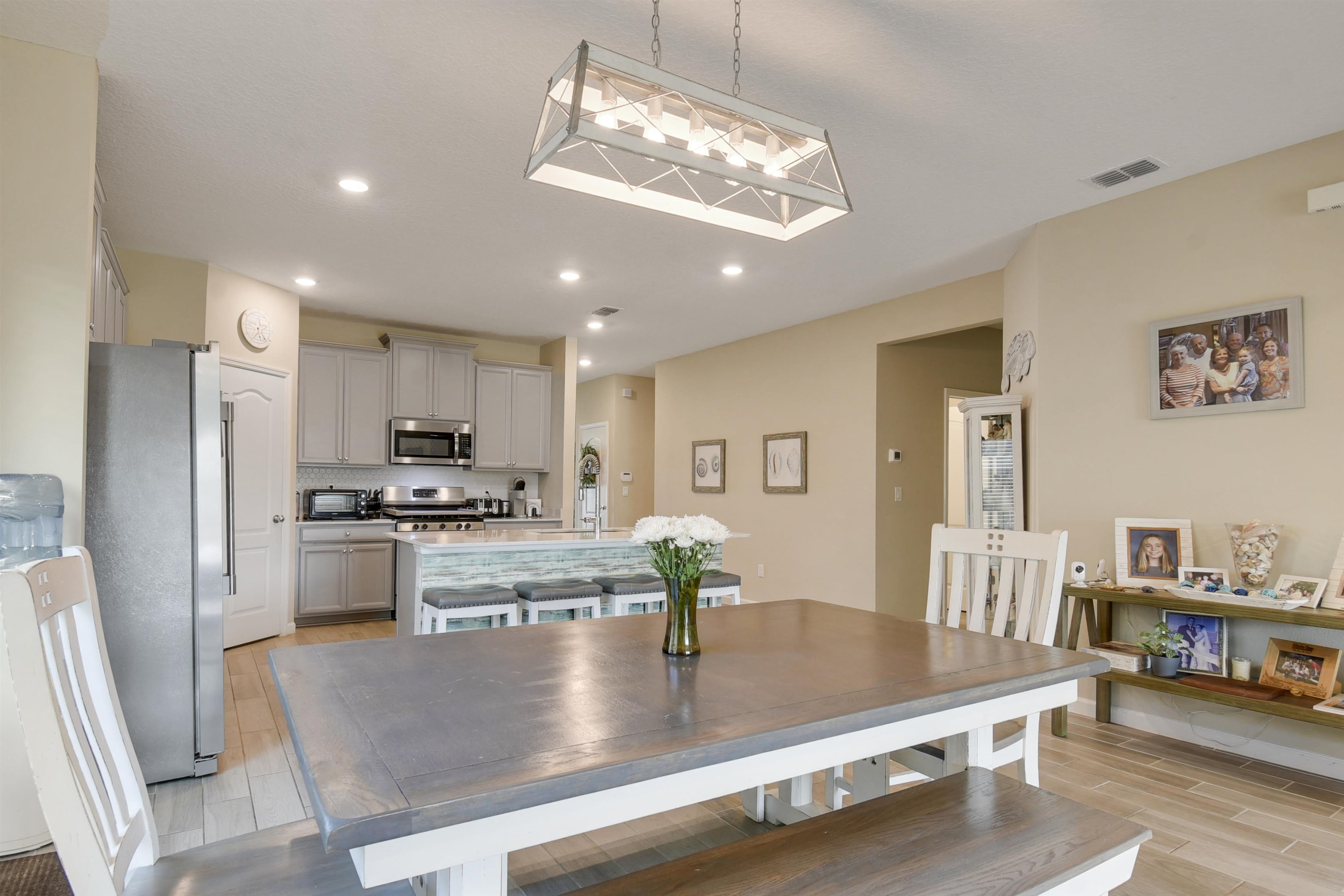 53 Cloverly Point St. Augustine, FL 32092 - Photo 15 of 51 a kitchen with stainless steel appliances granite countertop a refrigerator oven a stove white cabinets a sink and dishwasher