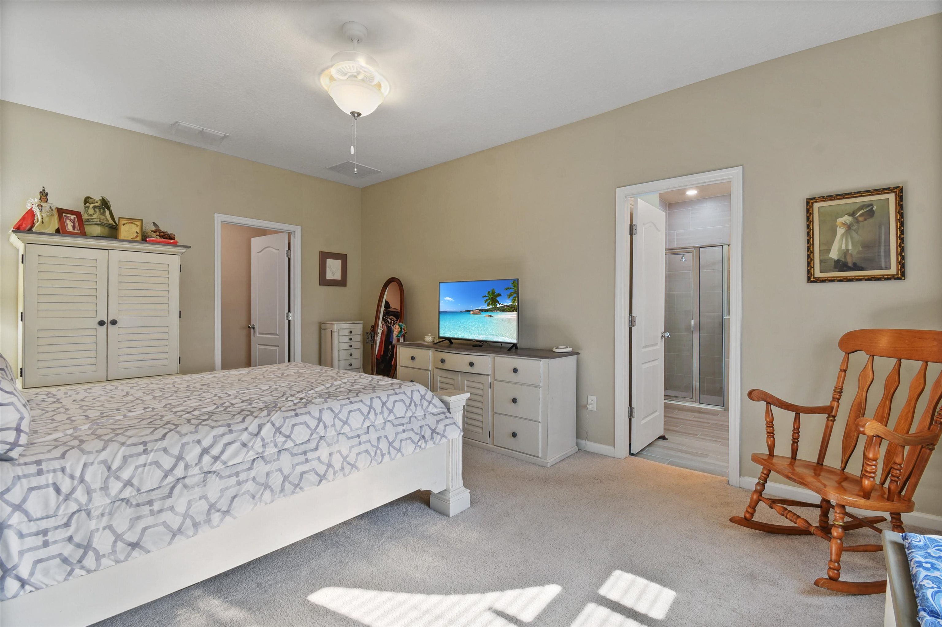 53 Cloverly Point St. Augustine, FL 32092 - Photo 20 of 51 a bedroom with a bed and furniture