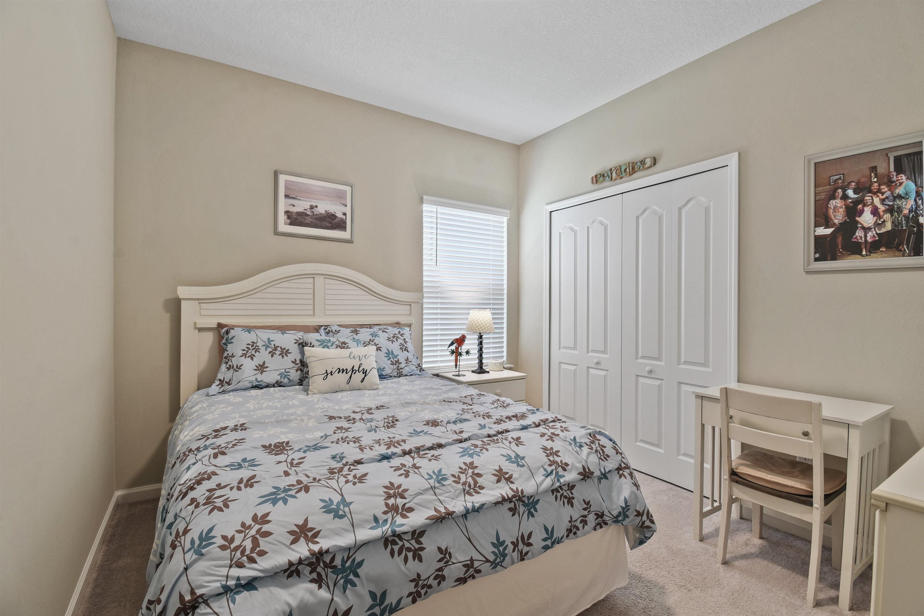 53 Cloverly Point St. Augustine, FL 32092 - Photo 29 of 51 a bedroom with a bed and a window