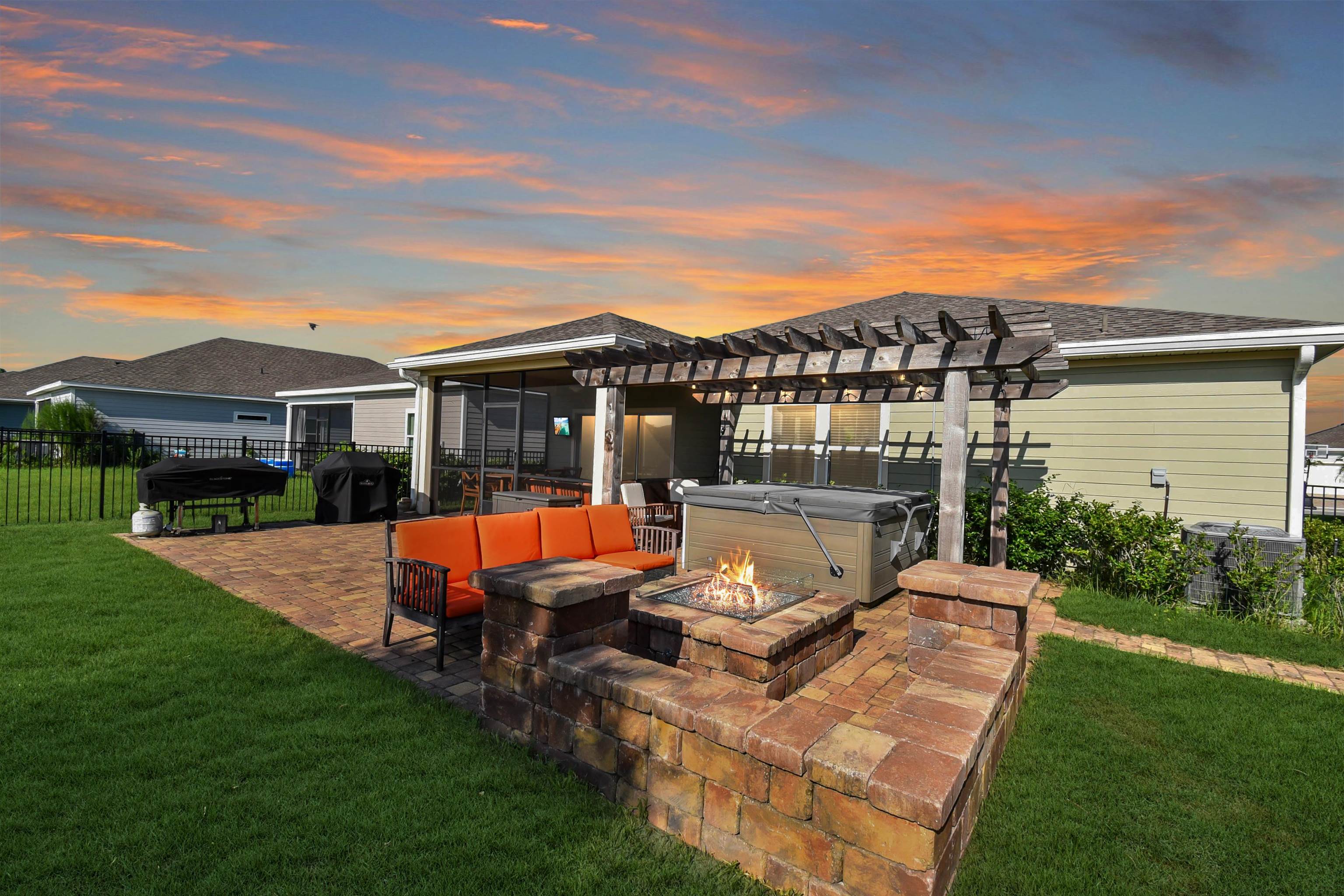 53 Cloverly Point St. Augustine, FL 32092 - Photo 34 of 51 a view of a house with a backyard and sitting area