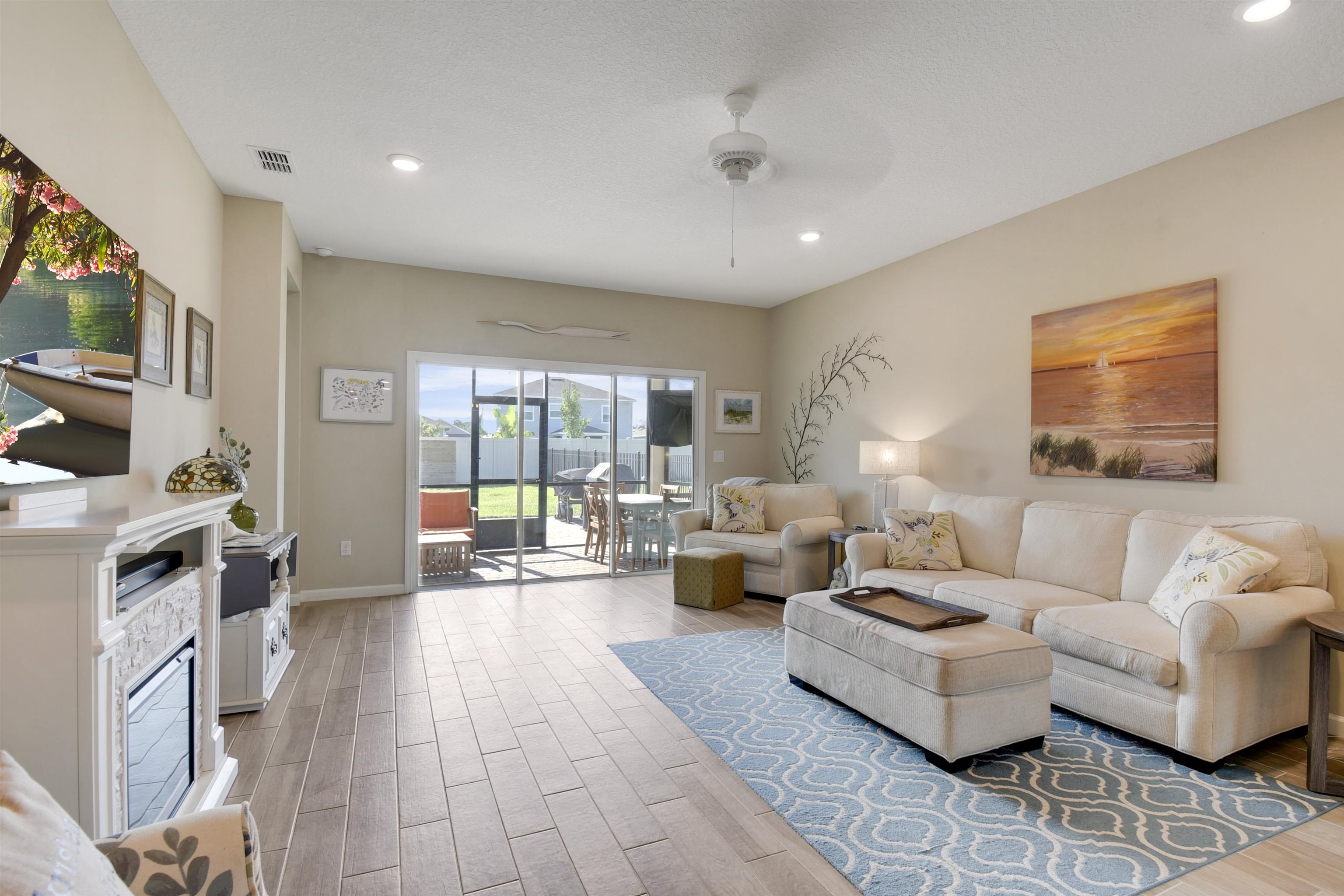 53 Cloverly Point St. Augustine, FL 32092 - Photo 10 of 51 a living room with furniture and a flat screen tv