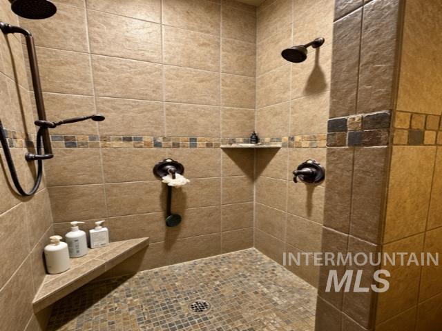 1520 Scheloske Road Weiser, ID 83672 - Photo 19 of 42 Built-in closet organization system with shelving, hanging space, and integrated bench seating