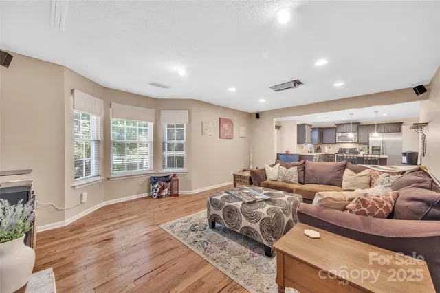 a room with cabinets and washer