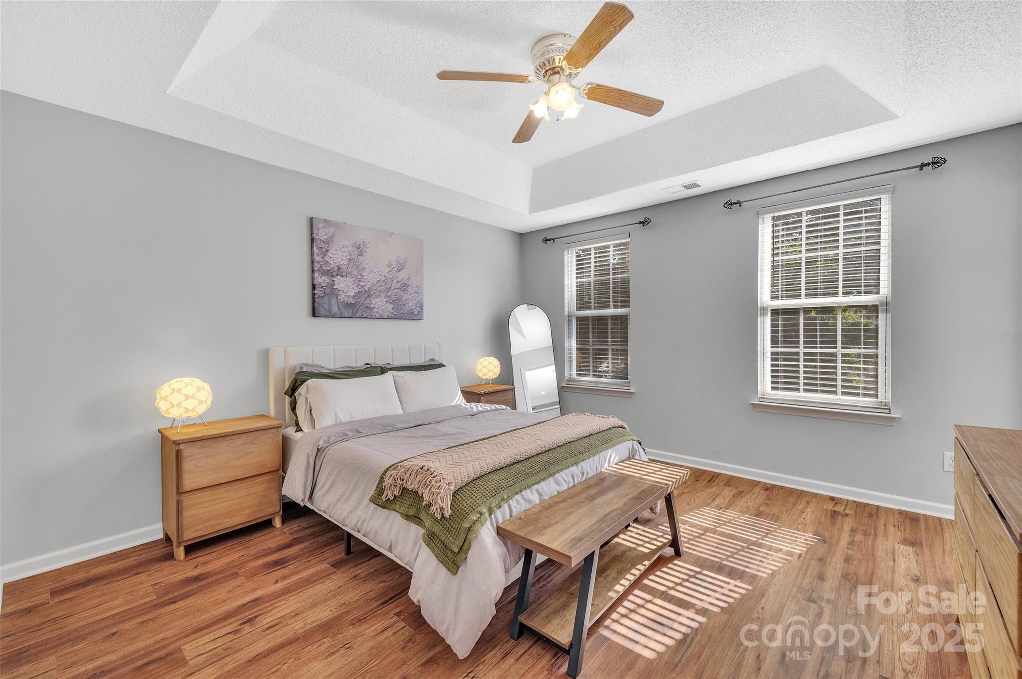 12351 Cardinal Point Road Charlotte, NC 28269 - Photo 23 of 43 a spacious bedroom with a bed and a window