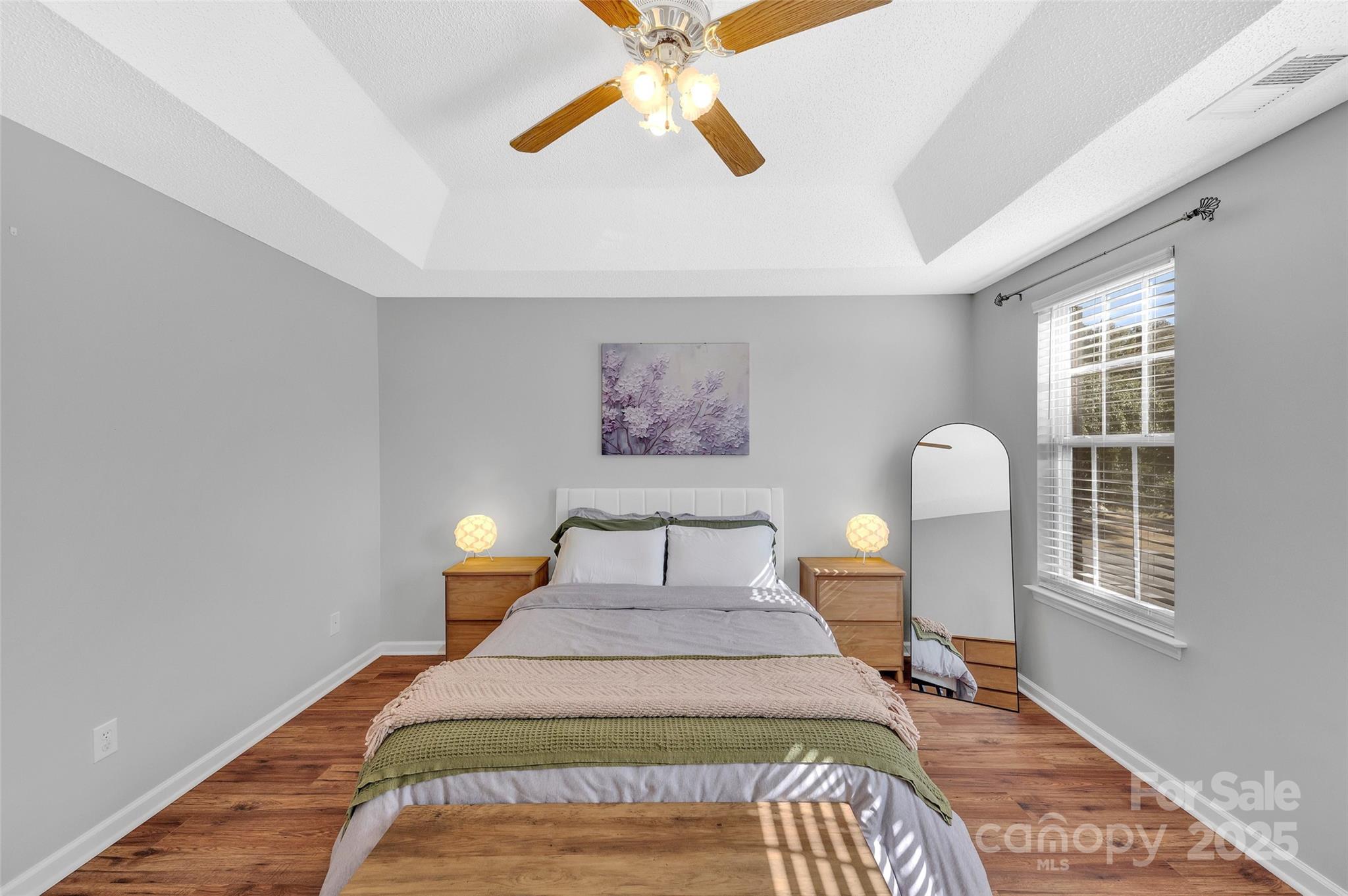 12351 Cardinal Point Road Charlotte, NC 28269 - Photo 26 of 43 a bedroom with a bed and a window