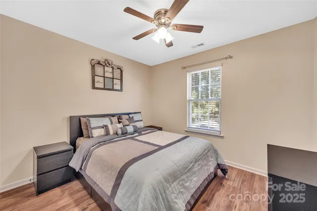 a bathroom with a sink mirror toilet and bathtub