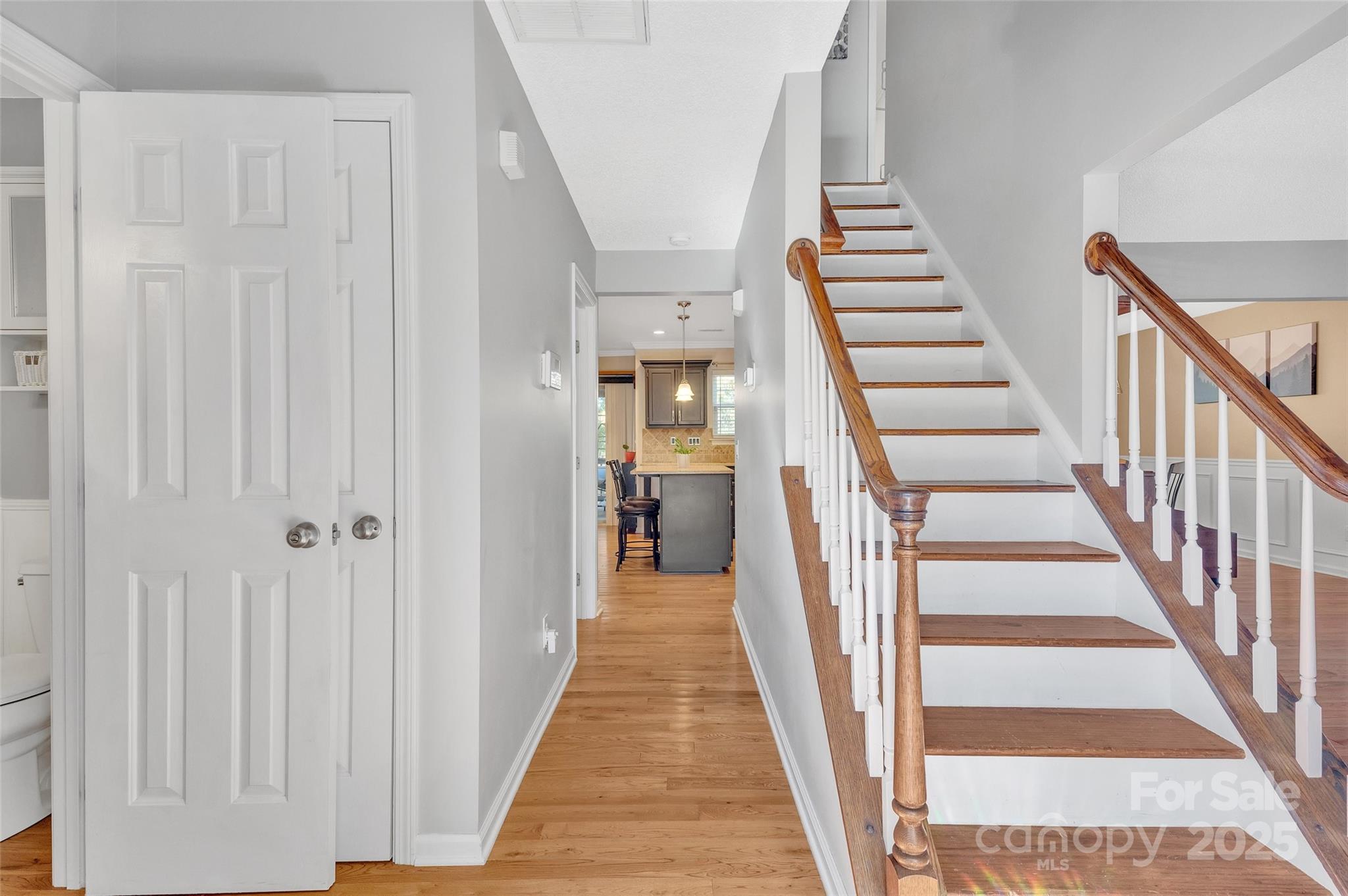 12351 Cardinal Point Road Charlotte, NC 28269 - Photo 6 of 43 a view of a hallway with wooden floor and entryway