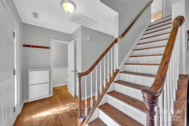 a view of a livingroom with furniture and wooden floor