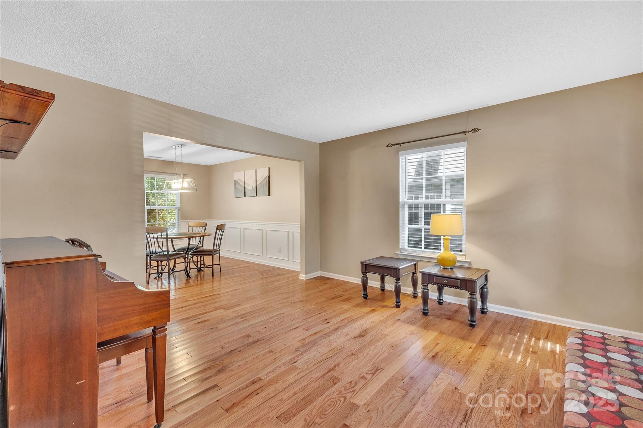 12351 Cardinal Point Road Charlotte, NC 28269 - Photo 8 of 43 a view of a livingroom with furniture and wooden floor