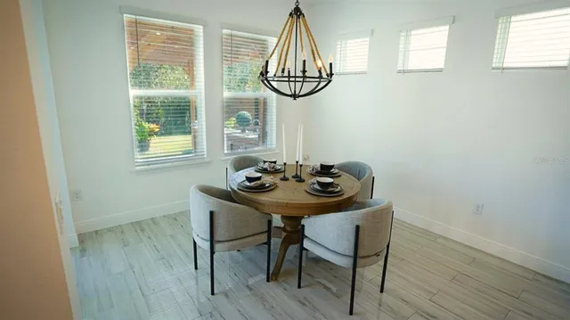 a large white kitchen with lots of counter space