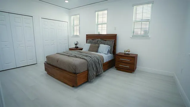 a view of a house with a yard and garage