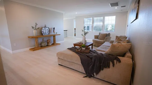 front view of a house with a garden