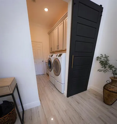 a front view of a house with a large window