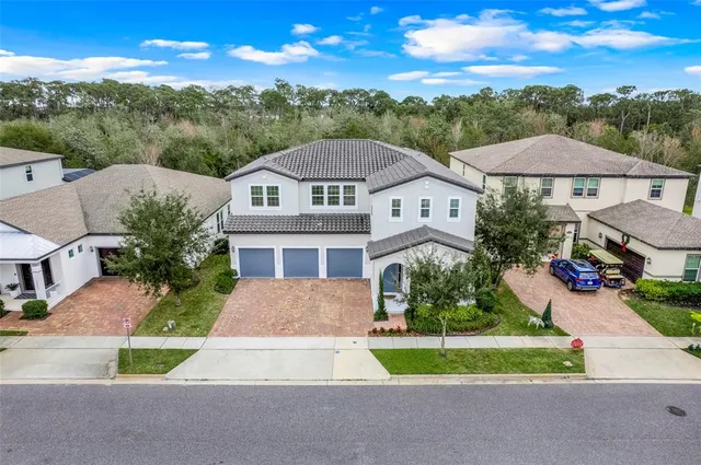 $1,190,000 | 10067 Austrina Oak Loop, Winter Garden, FL 34787