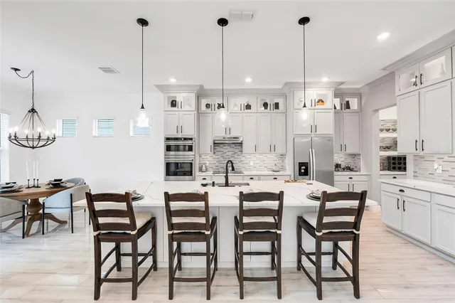 $1,190,000 | 10067 Austrina Oak Loop, Winter Garden, FL 34787