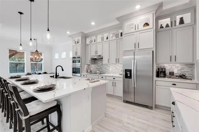 $1,190,000 | 10067 Austrina Oak Loop, Winter Garden, FL 34787