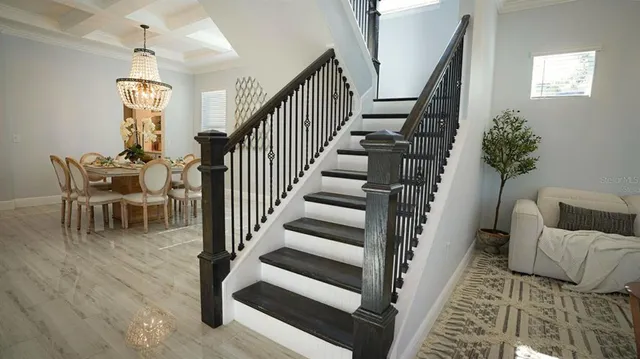 a large kitchen with cabinets and a stainless steel appliances