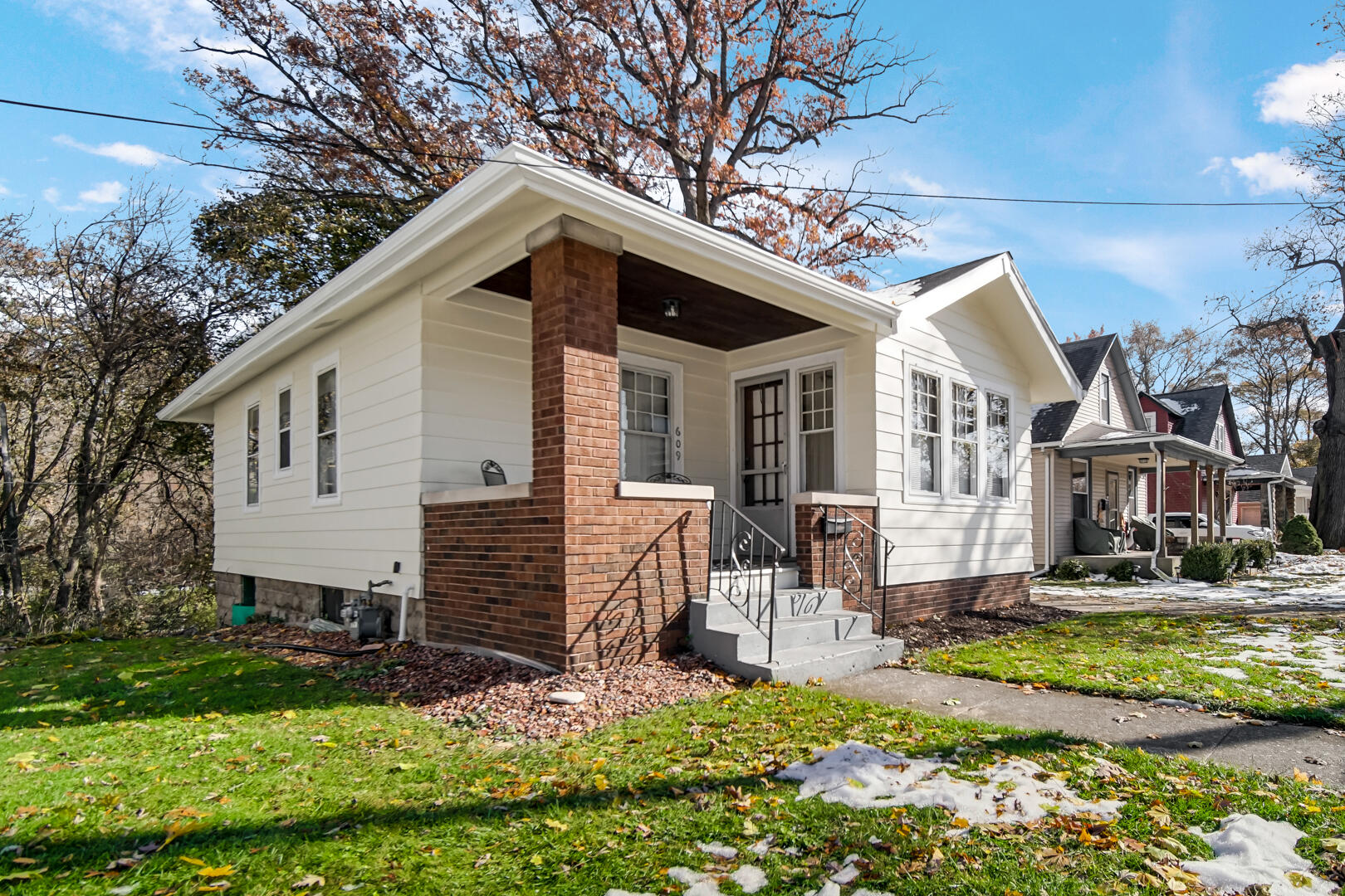 609 Main Street Hobart, IN 46342 - Photo 3 of 18 a front view of a house with a yard