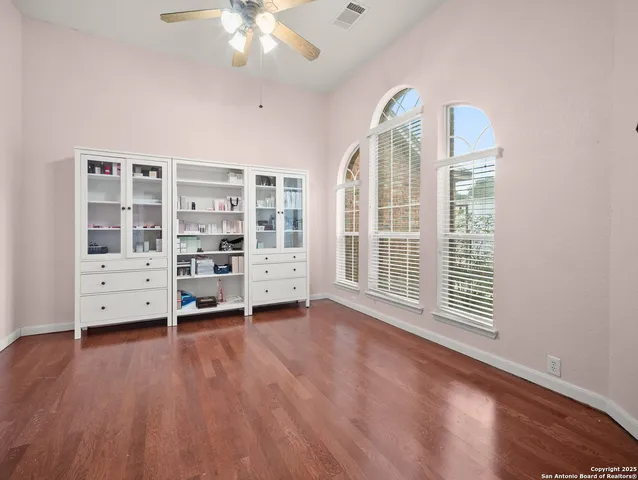 a view of livingroom with furniture and windows