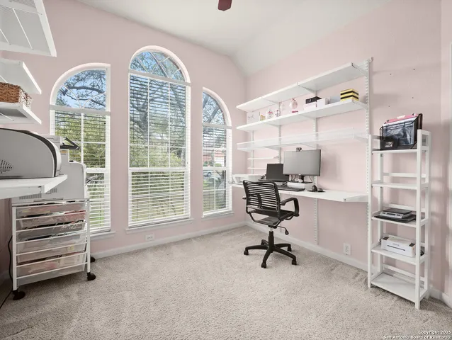 a view of a livingroom with furniture