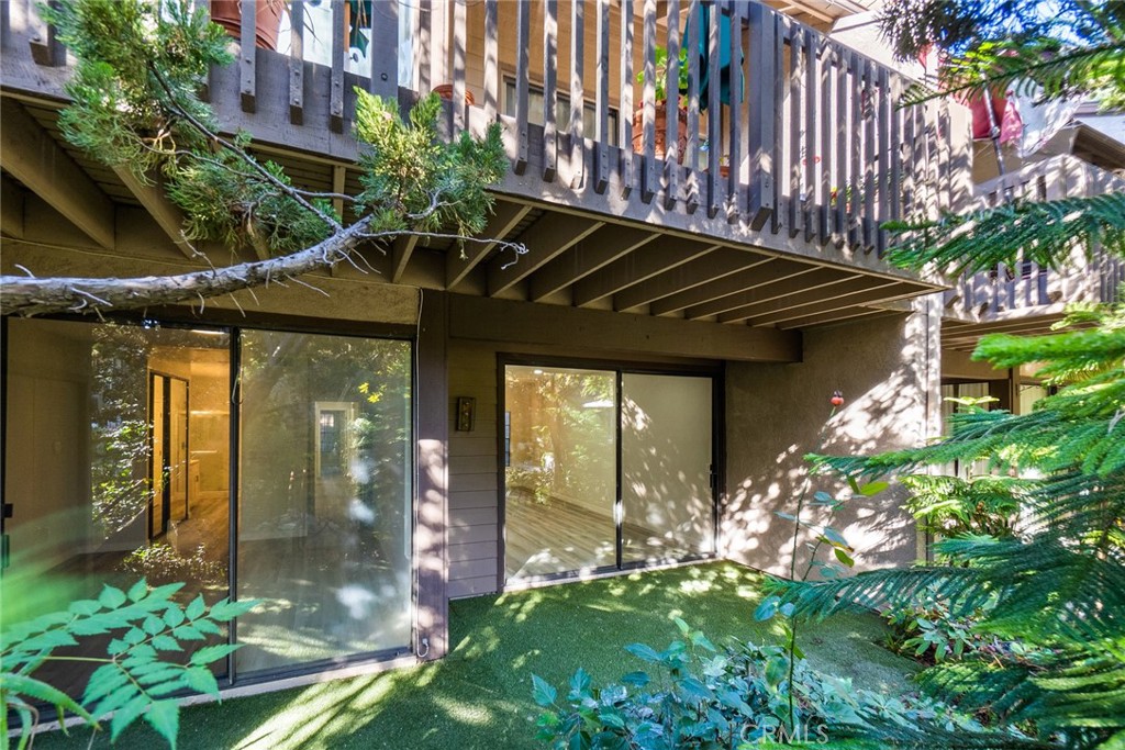 2504 West MacArthur Boulevard Santa Ana, CA 92704 - Photo 18 of 19 a front view of a house with a yard