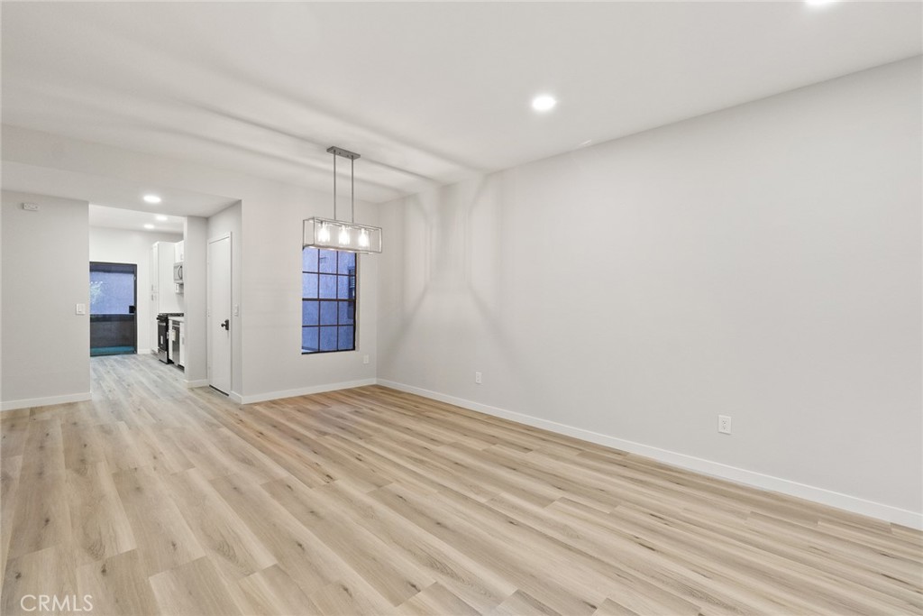 2504 West MacArthur Boulevard Santa Ana, CA 92704 - Photo 3 of 19 a view of an empty room with a window