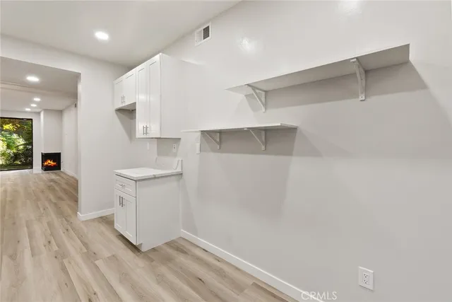 a view of hallway with washer and dryer