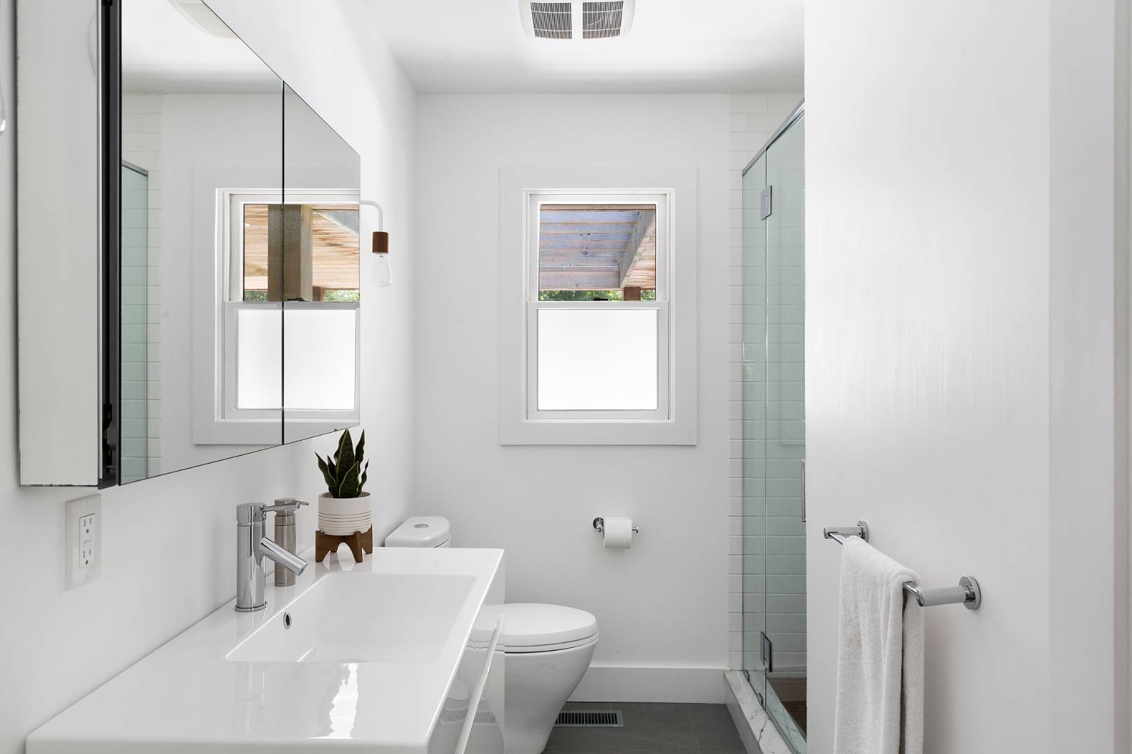 4 Jericho Close Lane East Hampton, NY 11937 - Photo 12 of 26 a bathroom with a sink and a mirror