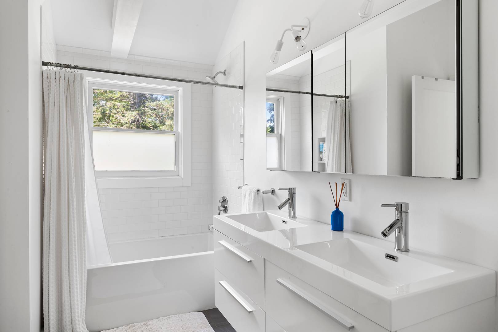 4 Jericho Close Lane East Hampton, NY 11937 - Photo 16 of 26 a bathroom with a double vanity sink mirror and double