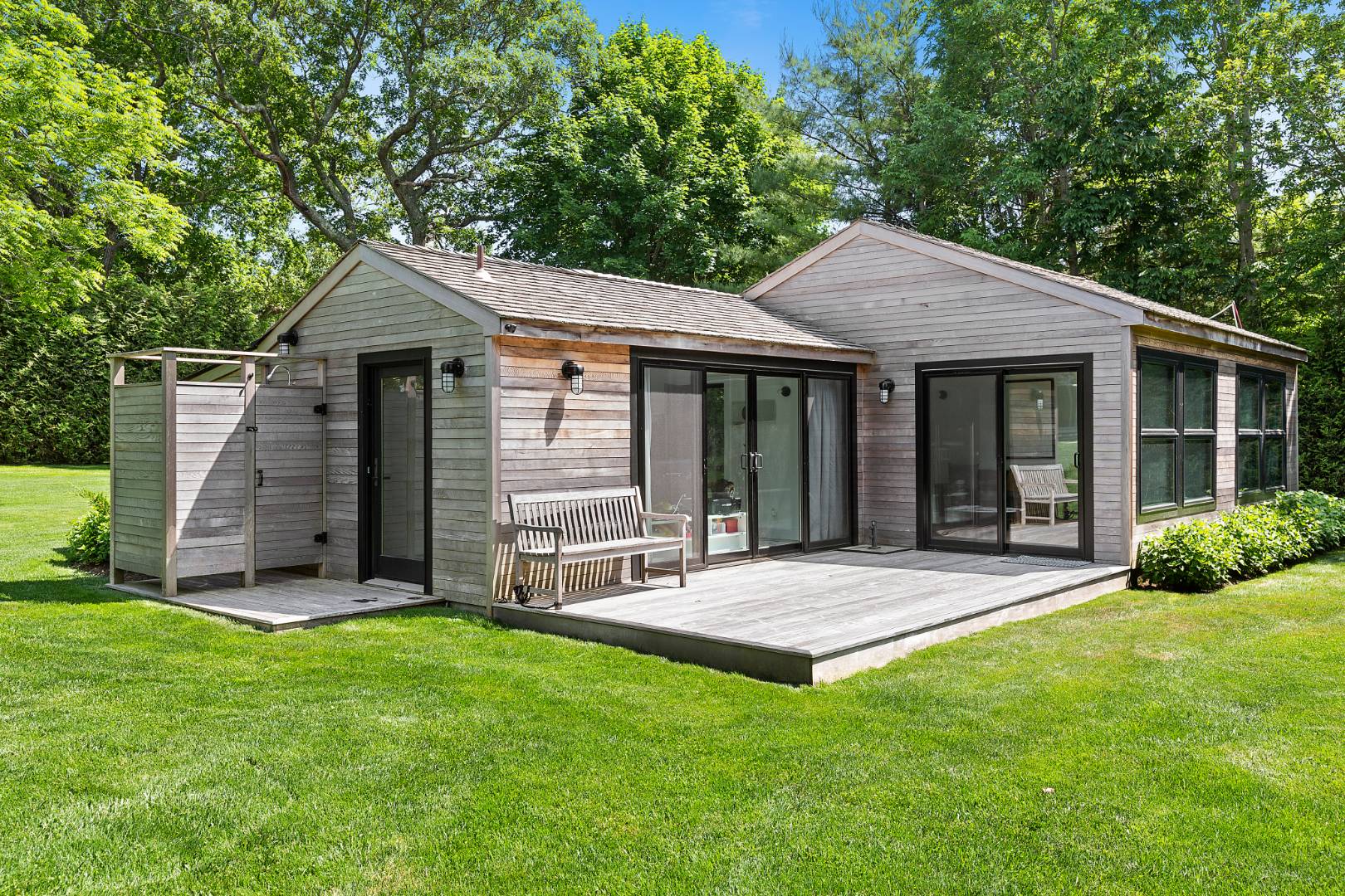 4 Jericho Close Lane East Hampton, NY 11937 - Photo 21 of 26 a view of a house with a yard and porch