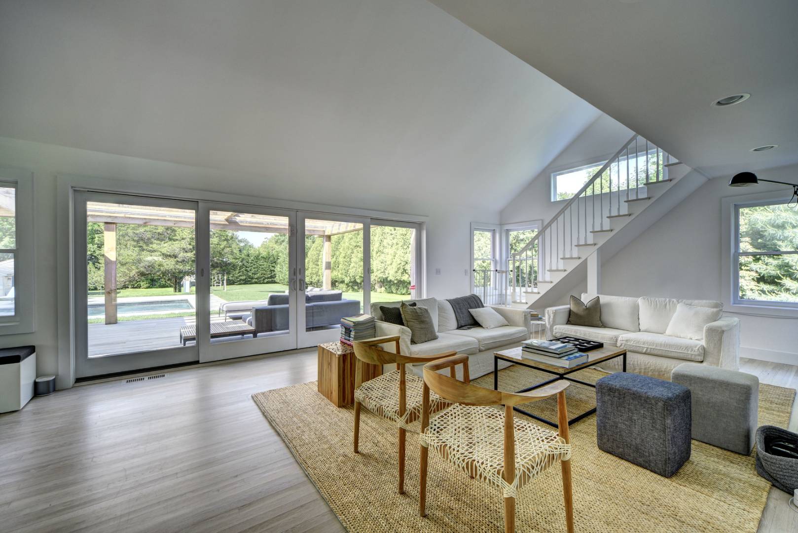 4 Jericho Close Lane East Hampton, NY 11937 - Photo 4 of 26 a living room with furniture and a large window