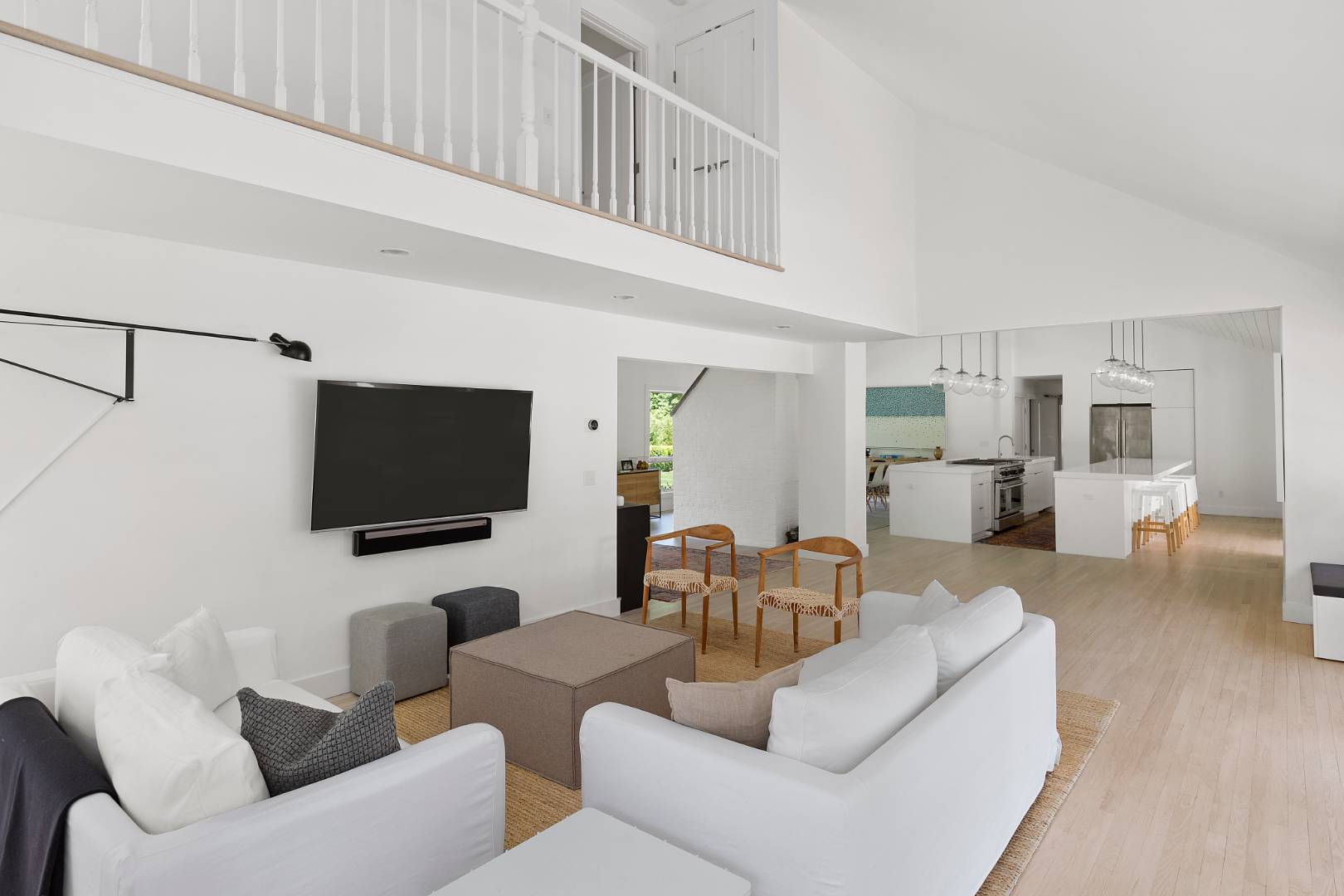 4 Jericho Close Lane East Hampton, NY 11937 - Photo 9 of 26 a living room with furniture and a flat screen tv