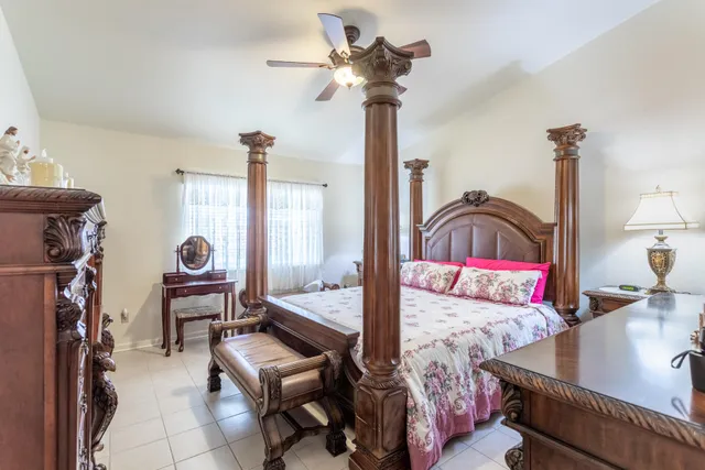 a bathroom with a tub and a window