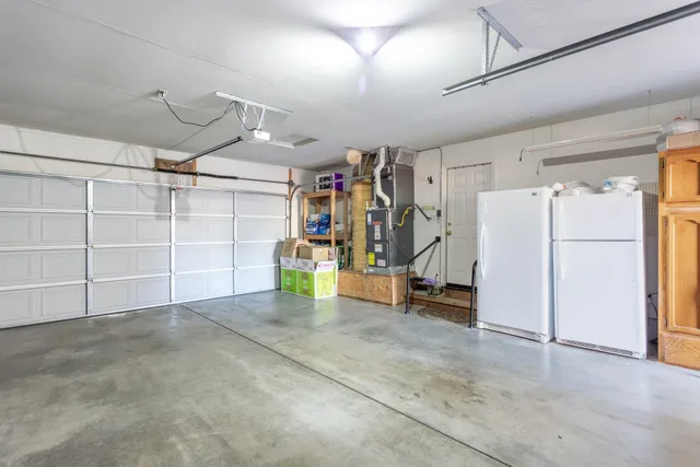 a view of a garage with refrigerator
