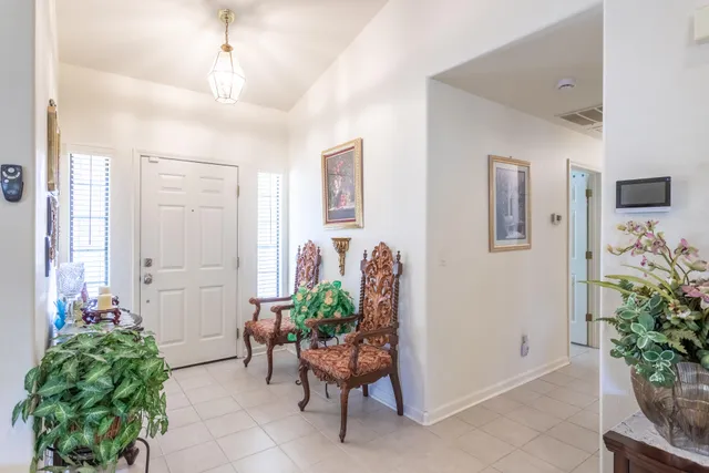 a large kitchen with lots of counter space and windows