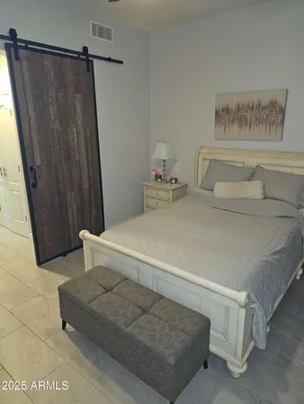 a bathroom with a tub and a shower