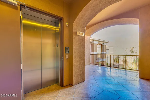 a view of entryway with a door