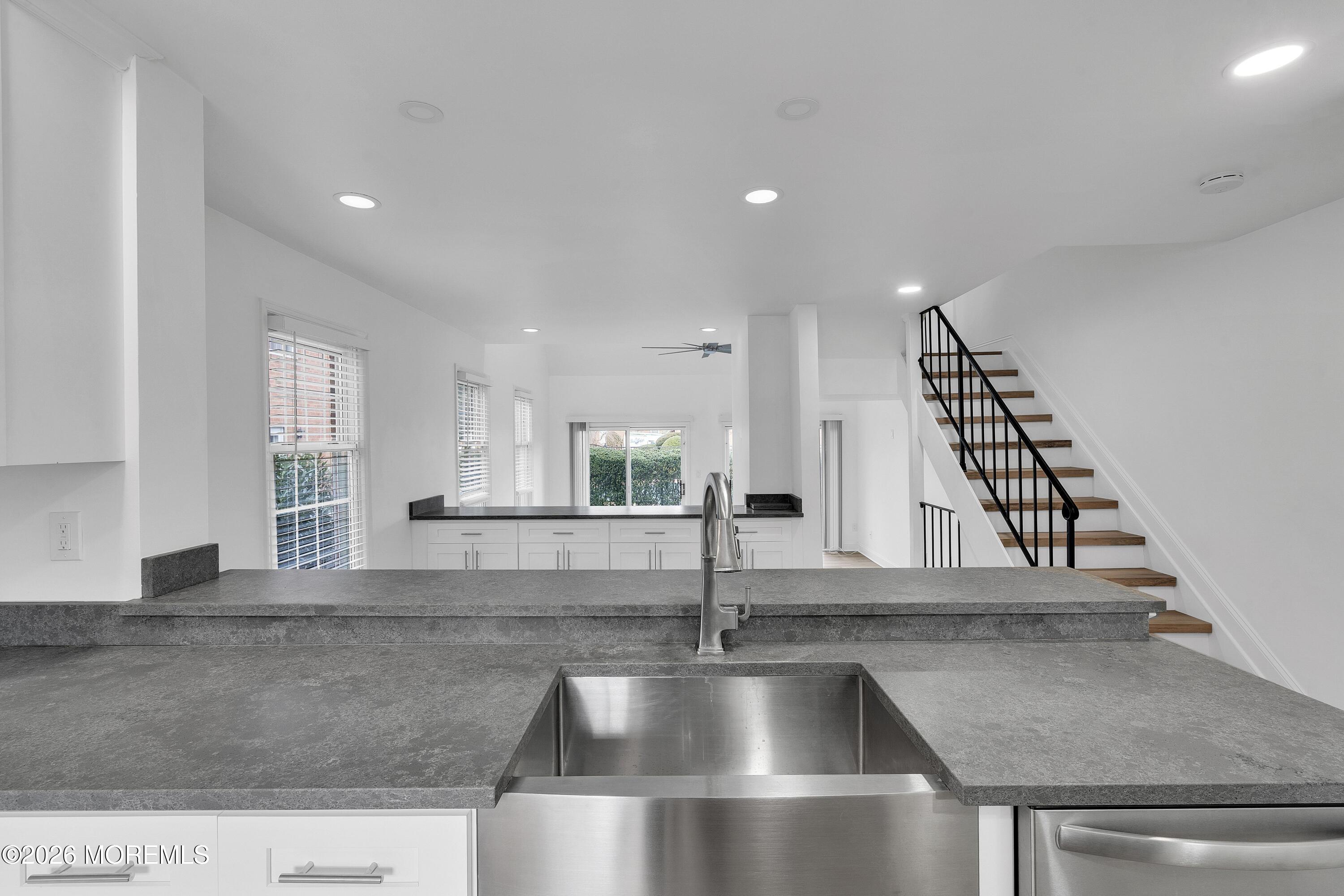 15 Wyckham Road Spring Lake Heights, NJ 07762 - Photo 13 of 38 a view of a kitchen with kitchen island a sink and a counter top space