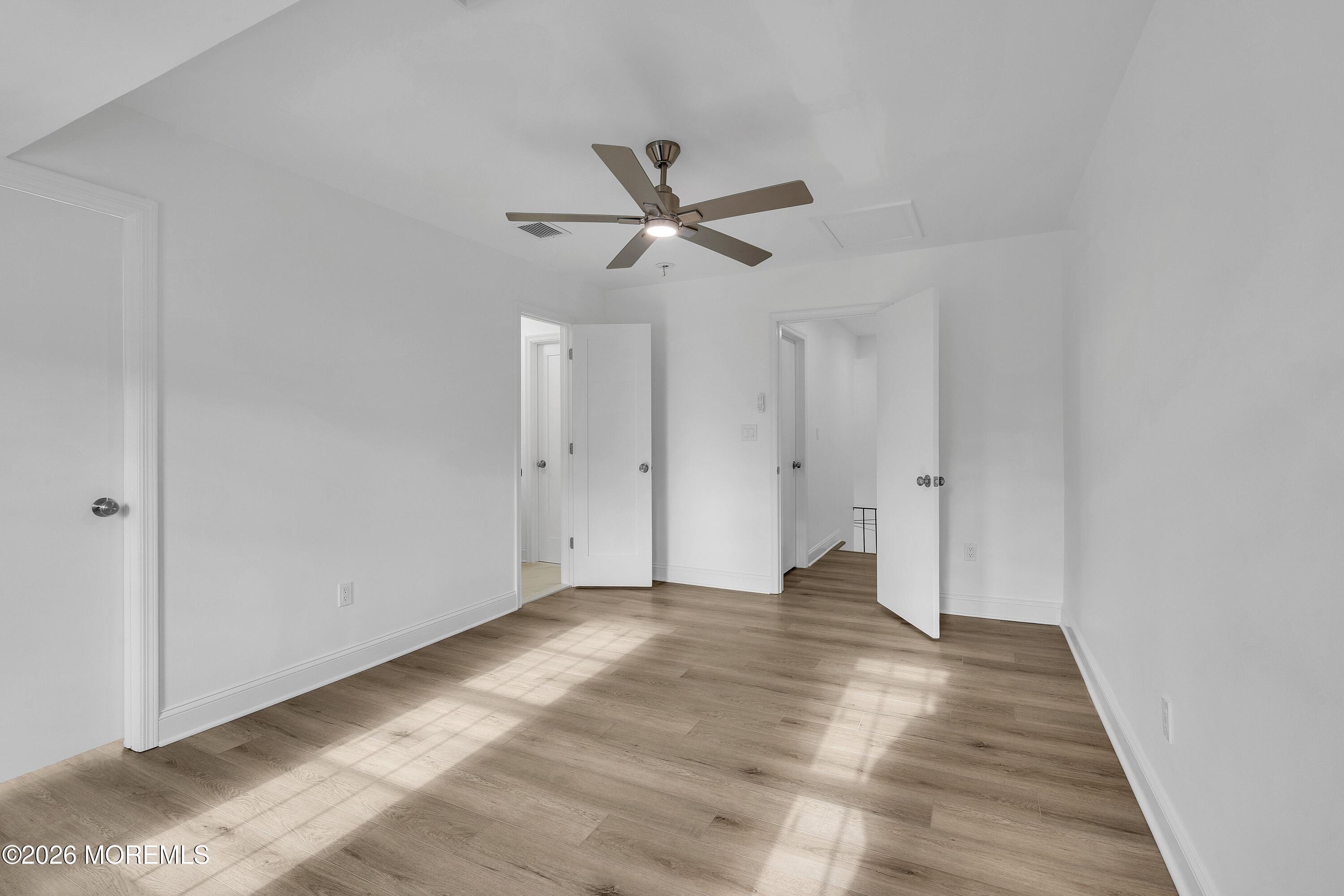 15 Wyckham Road Spring Lake Heights, NJ 07762 - Photo 20 of 38 a view of empty room with wooden floor