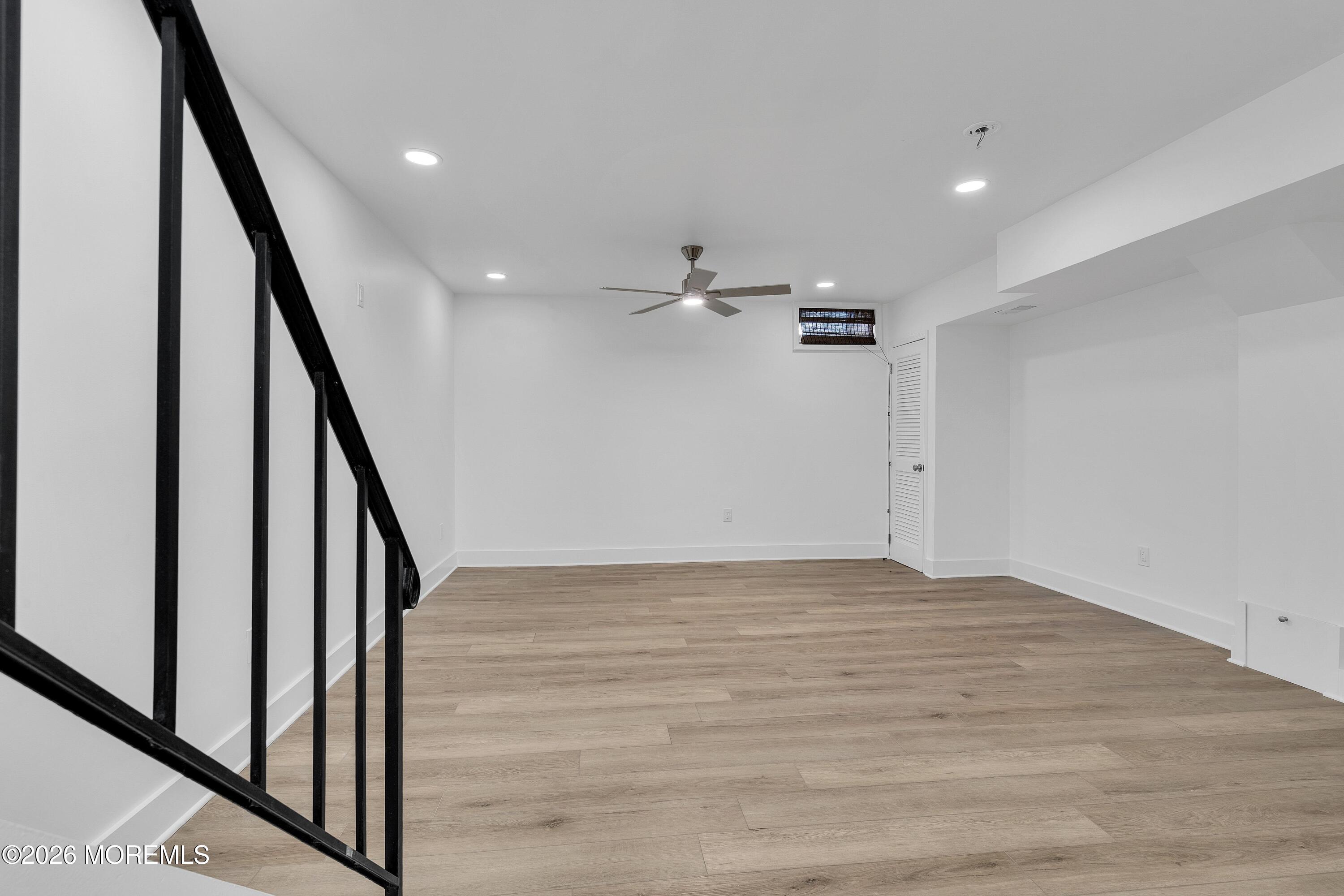 15 Wyckham Road Spring Lake Heights, NJ 07762 - Photo 27 of 38 a view of an empty room with stairs