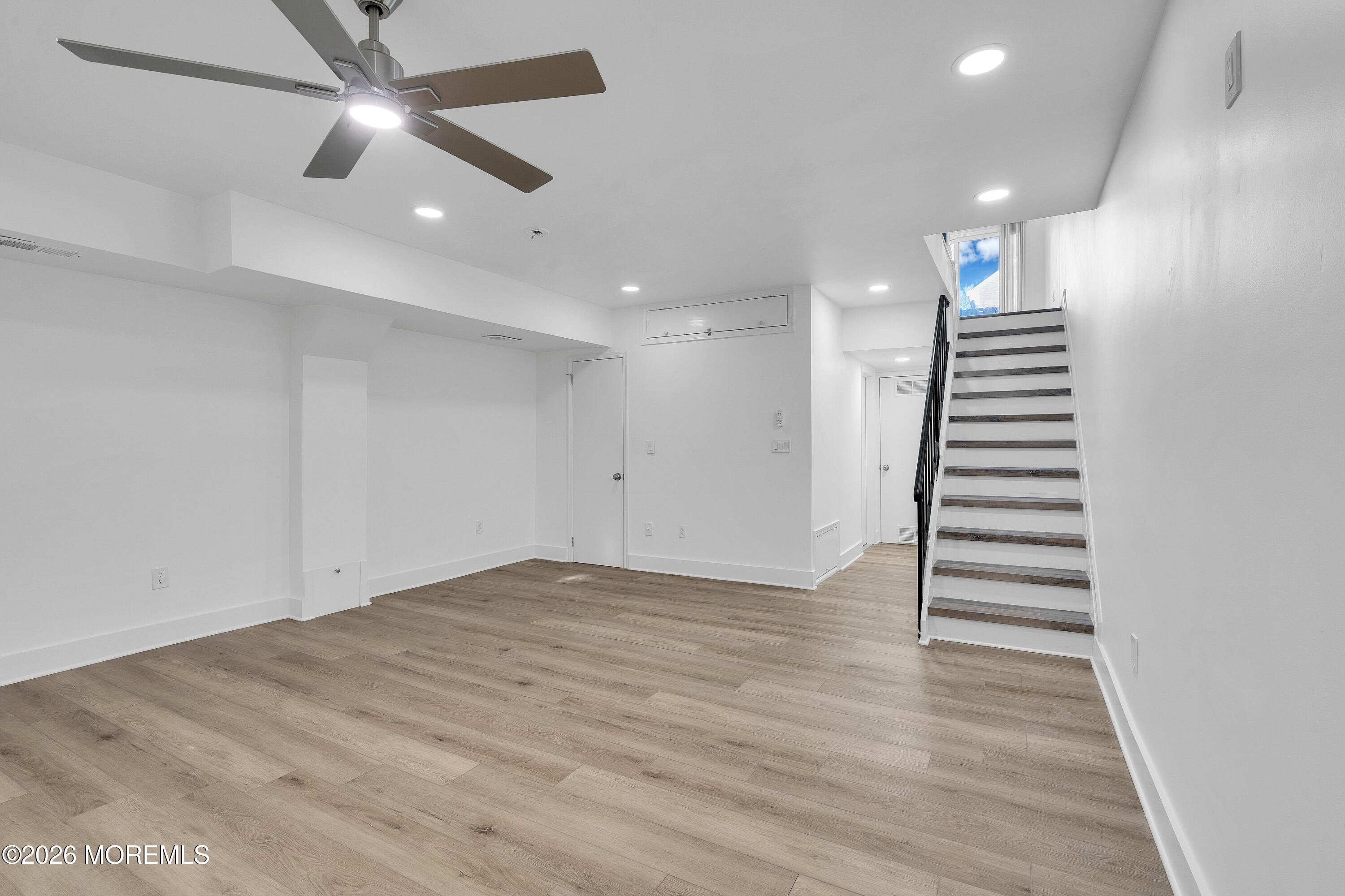 15 Wyckham Road Spring Lake Heights, NJ 07762 - Photo 28 of 38 an empty room with wooden floor