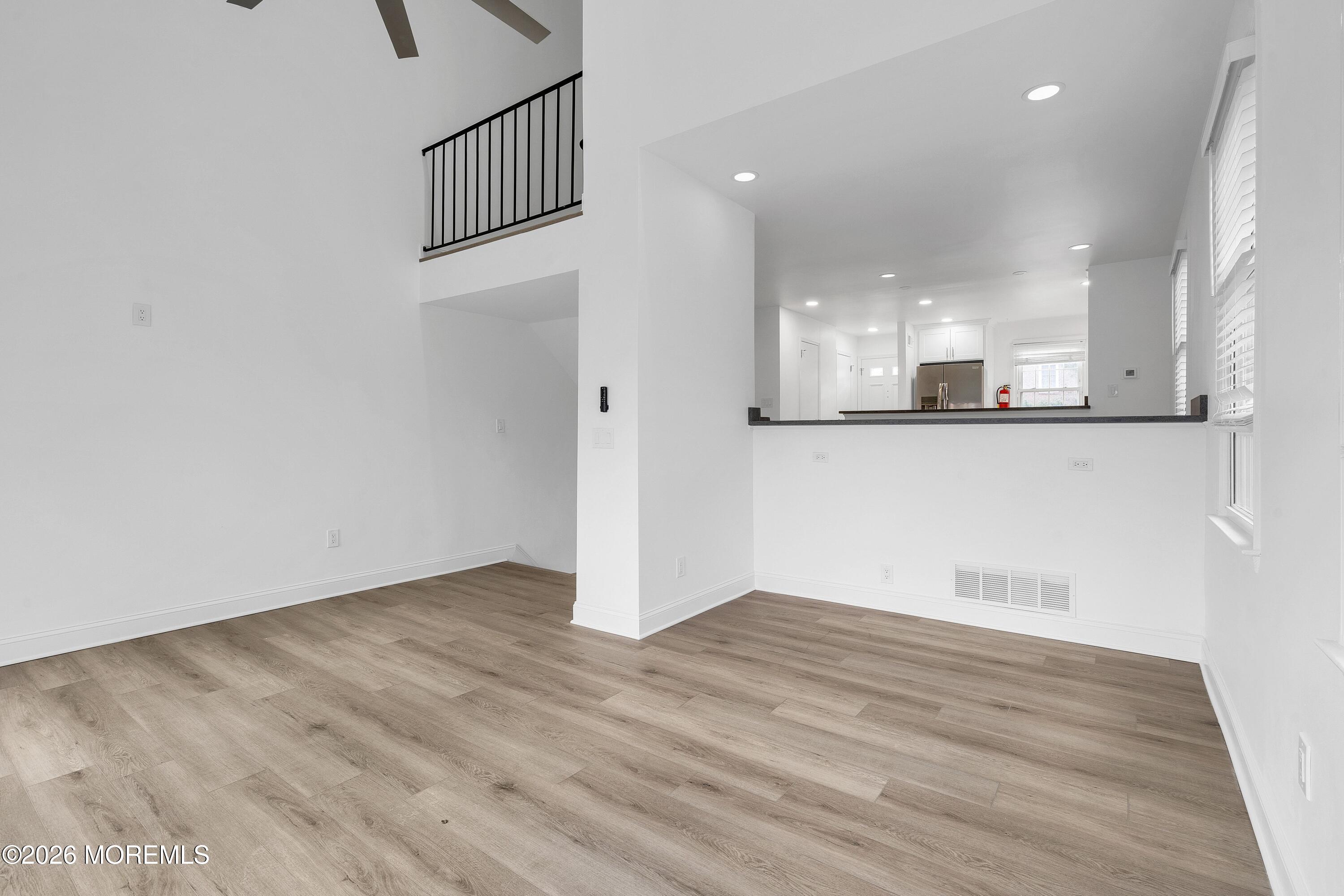 15 Wyckham Road Spring Lake Heights, NJ 07762 - Photo 4 of 38 a view of kitchen and wooden floor