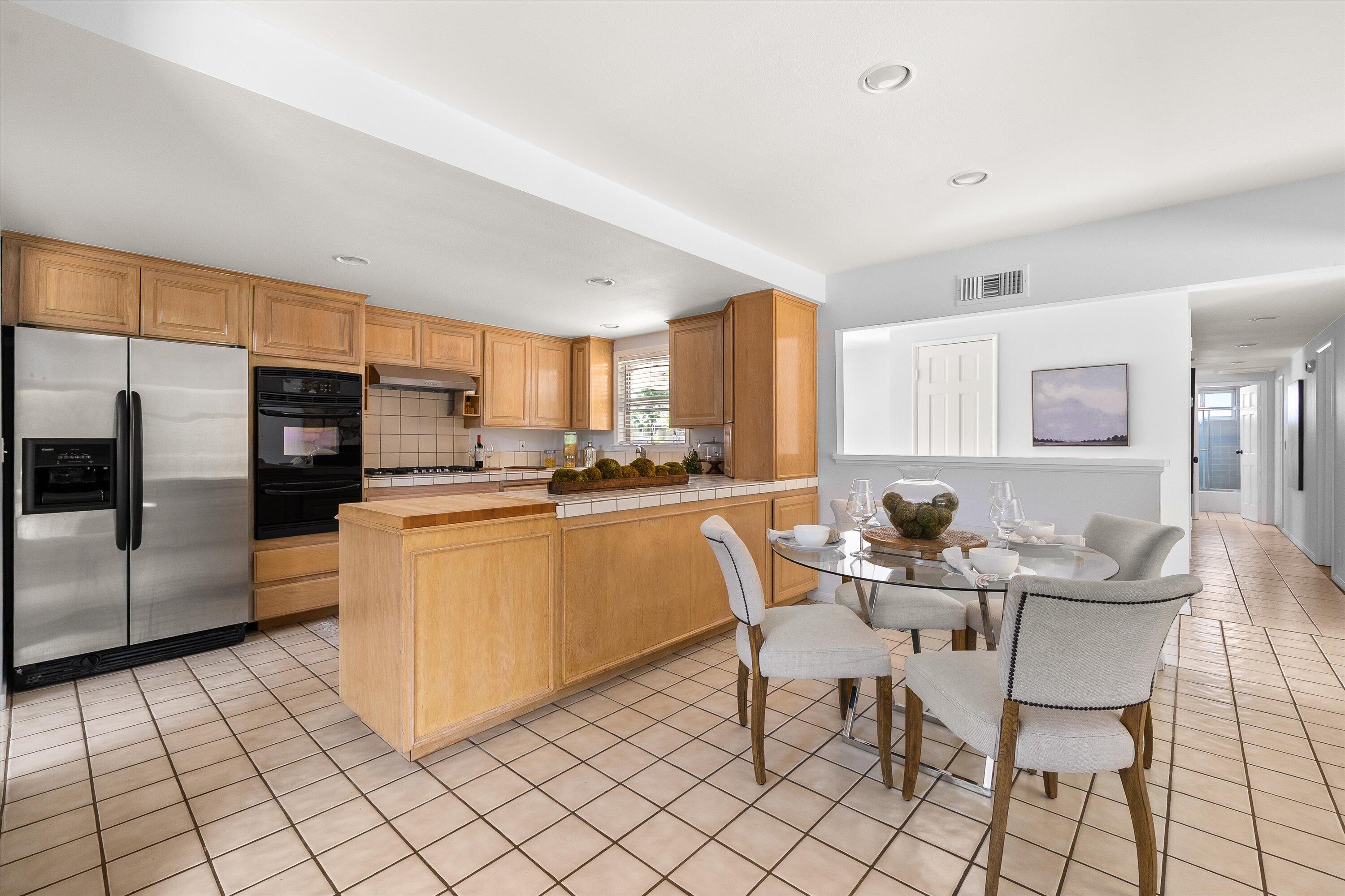 5668 Encina Road Goleta, CA 93117 - Photo 10 of 19 Dining area and kitchen
